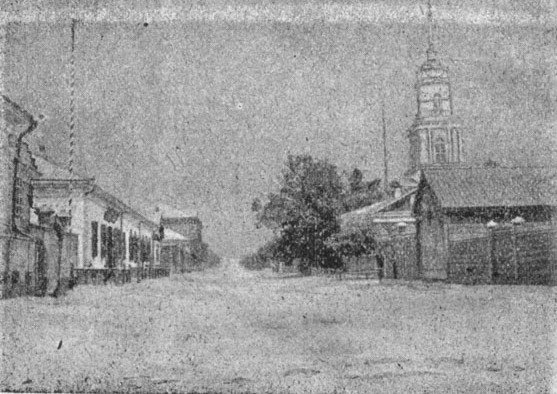 Balzer street scene (1911). Lutheran Church is on the right; parochial school is on the left. Source: Volksfreund Kalender, 1911.