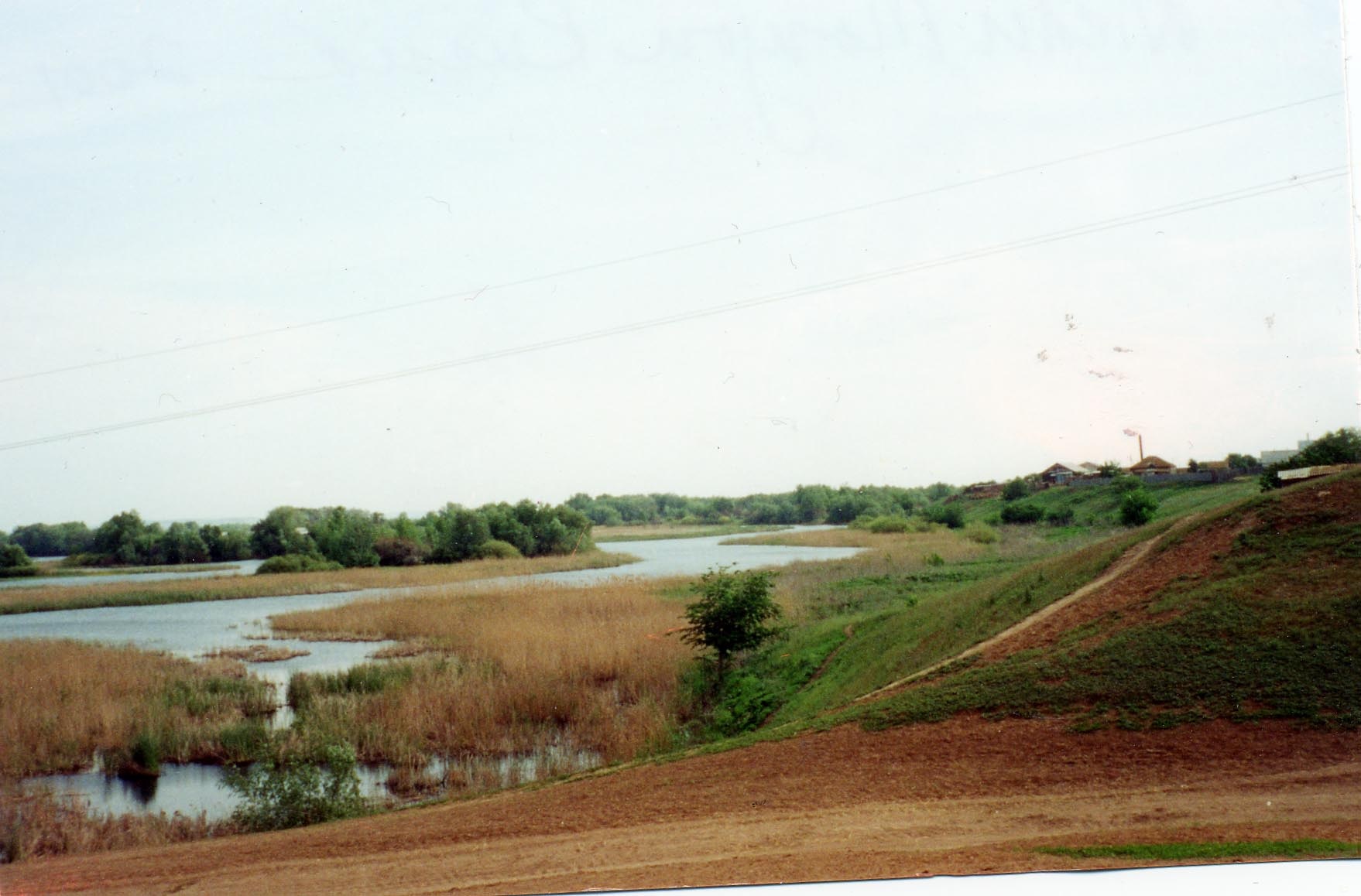 River below Nieder-Monjou which is on the bank to the right. Courtesy of Tim Weeder (2001).