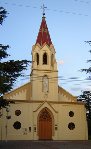 The church of Colonia Hinojo at sunset. The architecture of the church is very similar to the design of the church in Kamenka, Russia - the original home of the first settlers. Photograph courtesy of Gerardo Waimann.