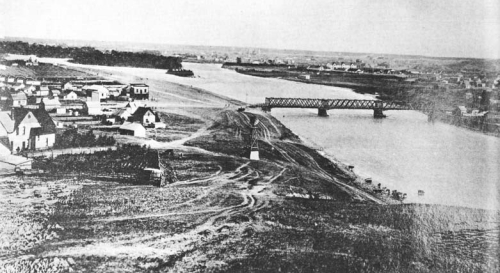 View of Germantown looking east towards Calgary; the Langevin Bridge connecting the village to the rest of Calgary (ca. 1900) Source: "Calgary, Then and Now," p. 113.