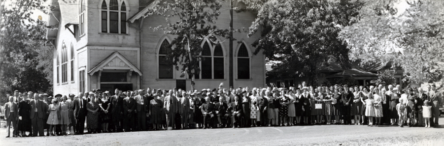 German Congregational Church (early 1940s) Walla Walla, Washington Rev. Schmidt's wife and daughter are standing behind him. Source: Ruth Dippel DeLuca.