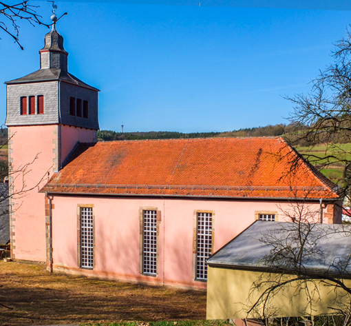 The Frielingen church, which dates to around 1600, is known for its pink exterior. Source: Evangelical Parish Kirchheim & Frielingen/Willingshain website.