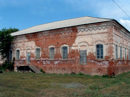 Former Laub church (August 2003), identified by the current villagers, who said the top of the church (steeple?) had been cut off. The church is now being used as a grainary. Source: Sharon White.